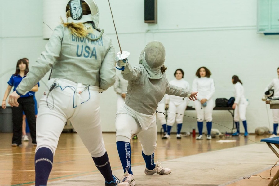 Senior Madeleine Barowsky finished 2-1 in sabre for the Blue in the 18-9 setback (Frank Poulin).