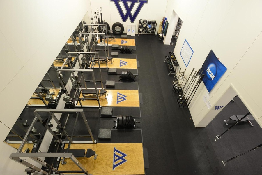 Weight room with four Olympic lifting platforms