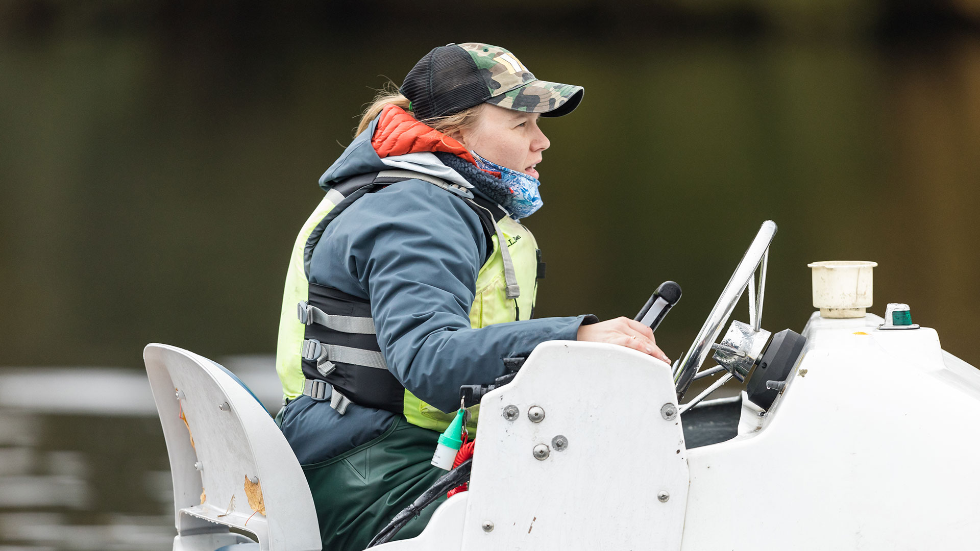 crew coach steering a boat 